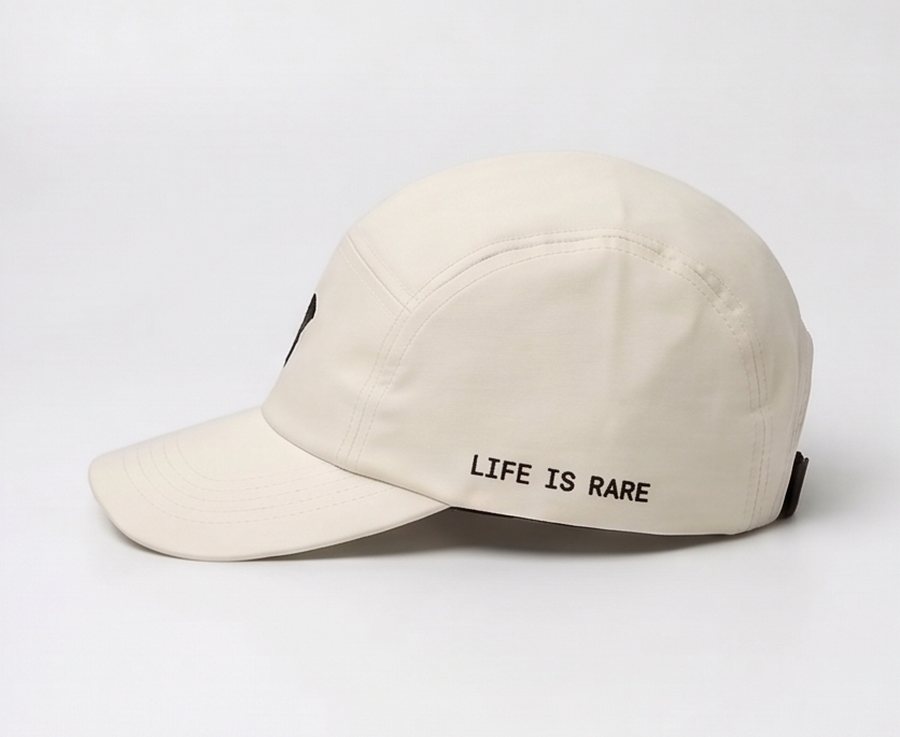 Ivory cap, left side: LIFE IS RARE